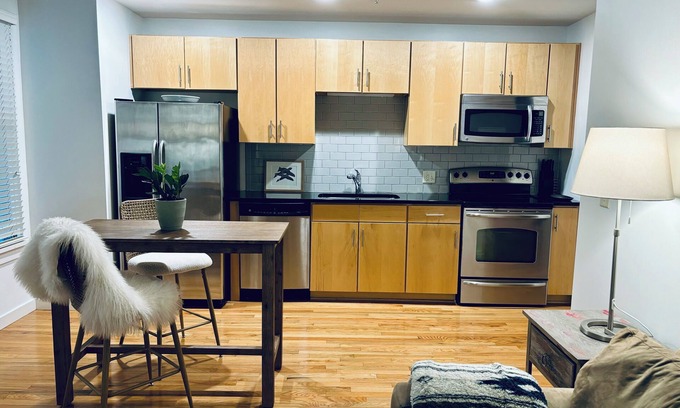 City Center Condo | cozy urban condo-free garage parking & upscale hotel amenities