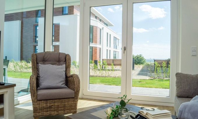Pelzerhaken Apartment | Cozy vacation apartment with sea view & terrace at Südkap A-03 in Pelzerhaken