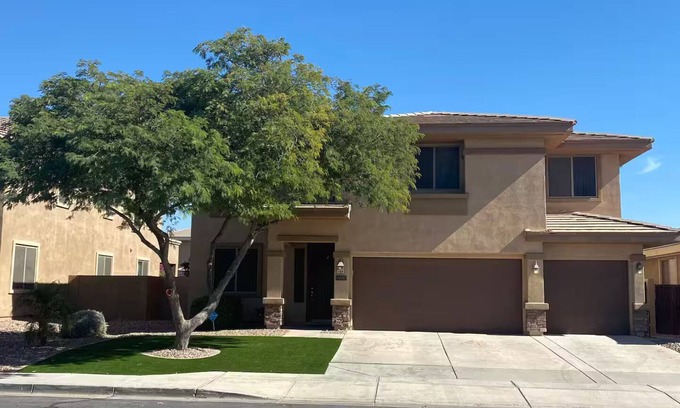 Roosevelt Park House | Custom home with 5 Beds & 5.5 Baths! A heated pool & spa make the backyard feel like a resort