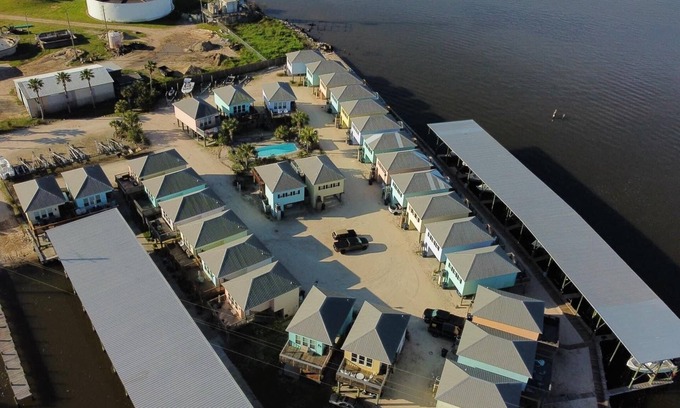 Fish Camps Condo | Cute waterfront bungalow, tons of amenities, a small gated fishing community!