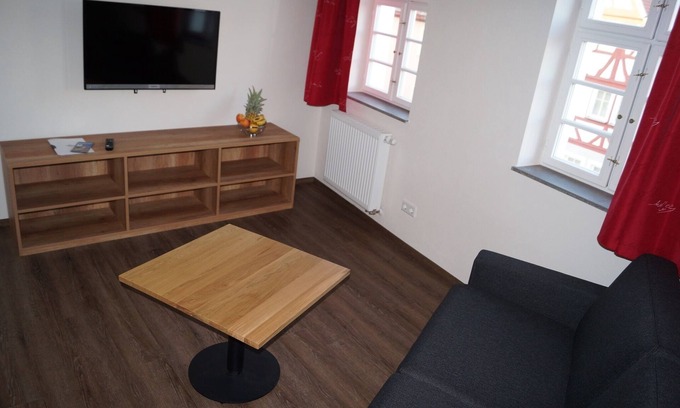Bad Windsheim Apartment | Dachgeschoß Wohnung für 4 Personen mit Blick über die Dächer der Altstadt