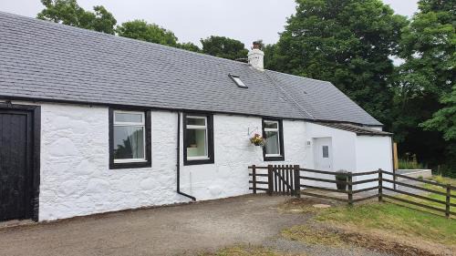 Girvan House | Dairy Cottage with sea views