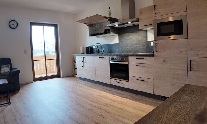 Prien am Chiemsee Apartment | Day courtyard new build apartment
