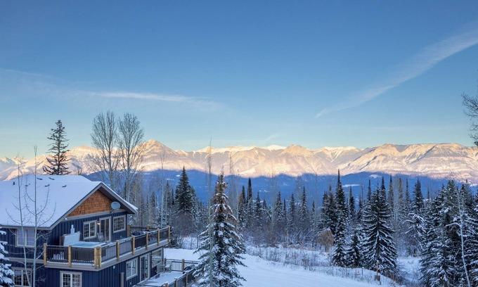 Golden Condo | Deckview: 2-bedroom top floor condo with hot tub and mountain views