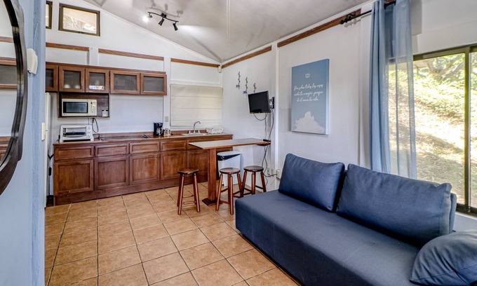 Santa Eulalia House | Delightful cabin in Atenas with terrace, garden view, and shared pool!