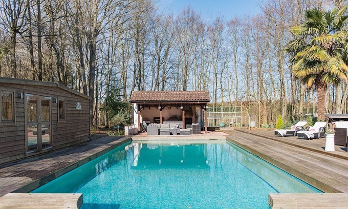 Doddington House | Delightful lodge located in the middle of Sharsted Wood near Canterbury with a pool!