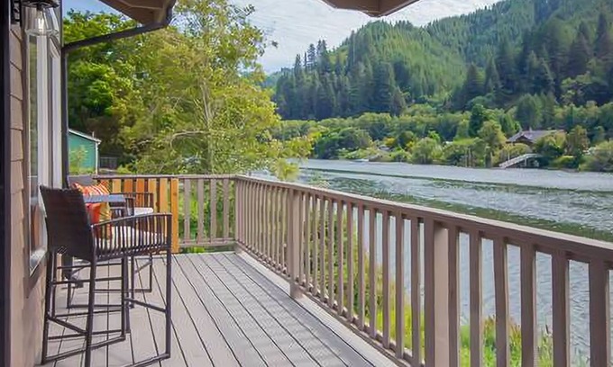 Mapleton House | Delightful riverfront home with dock, game room, fast WiFi, kayaks & grill