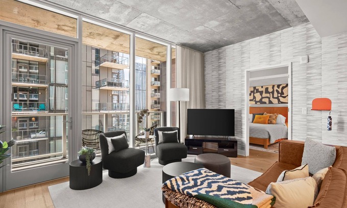 East Cesar Chavez Condo | Designer Condo Steps to Lady Bird Lake with gym & rooftop pool