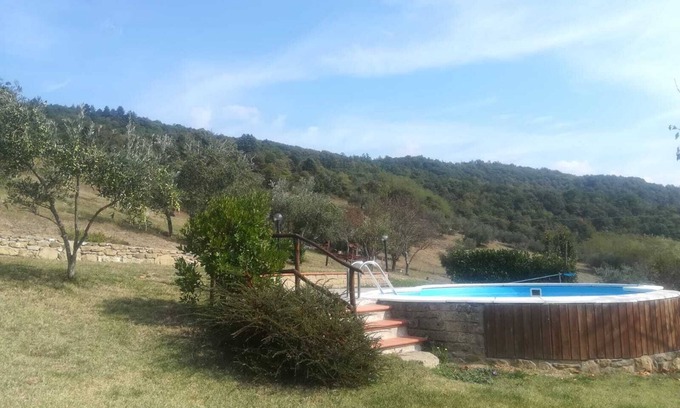 Dicomano Other | Detached stone view cottage with swimming pool and fenced garden.