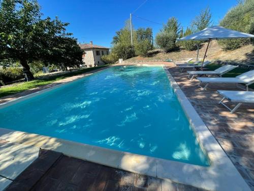 Loreto Villa | Detached villa - sleeps 10 - pool - pergola - playground for children - wifi