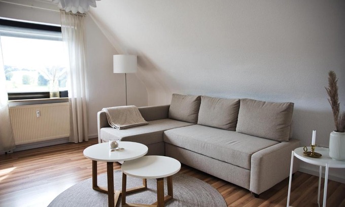 Michelbach Apartment | DG-Wohnung mit sonnigem Balkon
