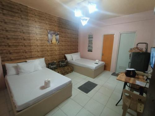 Cabanatuan Apartment | DJCI Apartelle Walk to Robinson & NE Pacific Mall 3 Min to SM Cabanatuan