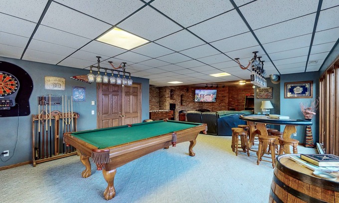 Sturgis Cabin | Dog-friendly cabin with private hot tub, foosball, pool table, arcade, fireplace