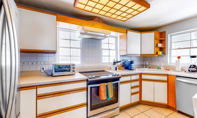 Lower Matecumbe Beach House | Dog-friendly escape with private dock, porch, balcony, water view, & central AC