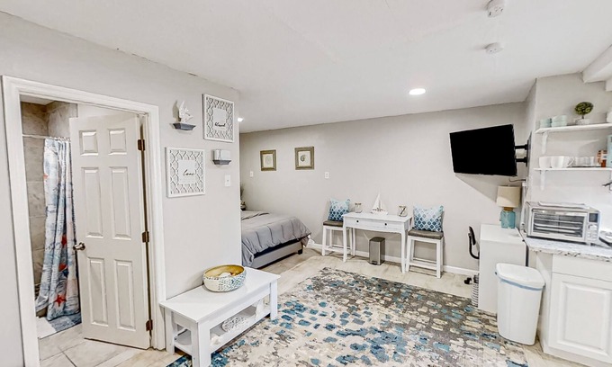 Bearss Plaza Apartment | Dog-friendly, lakeview retreat with kitchenette, yard, & electric grill