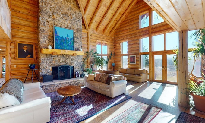 Glenwood Springs Cabin | Dog-friendly, mountain view lodge with a game room, fireplace, large deck, & W/D