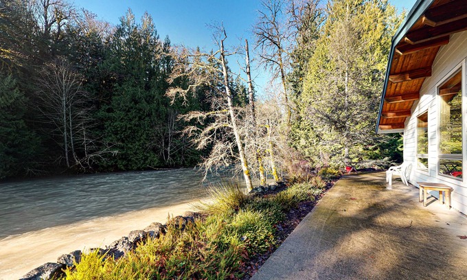 West Hills House | Dog-friendly, riverfront getaway with a wood stove & full kitchen!