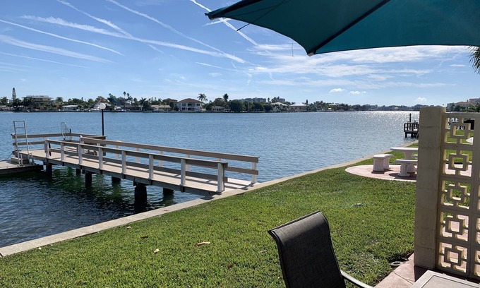 Treasure Island Condo | Dolphin & Manatee At Your Back Door!