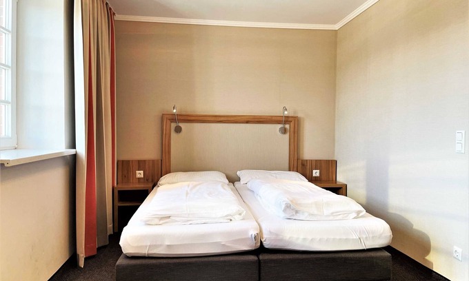 Lauta House | Doppelzimmer 205 - IBS Begegnungszentrum