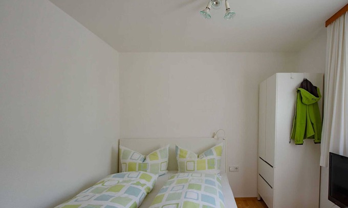 Mellau Apartment | Doppelzimmer Weiss - Gästehaus Lässer