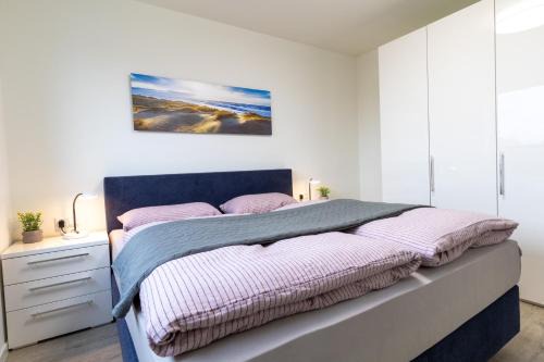 Dorumer Neufeld Apartment | Dorumer Sielhuus 13 mit Sauna und Balkon