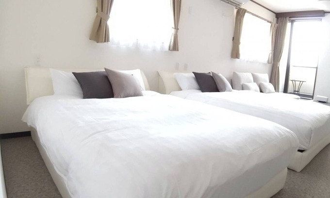Fujikawaguchiko Apartment | Double bed twin room with a view of Mt Fuji/Minamitsuru-gun Yamanashi