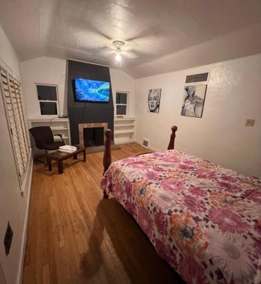 F. Q. Story House | Downtown Neighborhood Room 1