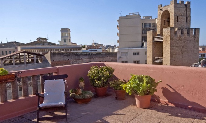 Oristano Apartment | Downtown penthouse with tower view - Cozy penthouse facing to the tower
