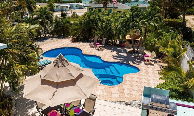 Marathon House | Dragonfly Lite – A tropical oasis with your own heated saltwater pool to enjoy!