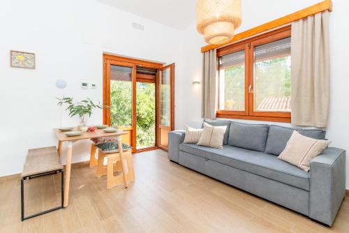Can Ginebre Apartment | El Huerto - Großzügiges Appartment in Katalanischer Masia