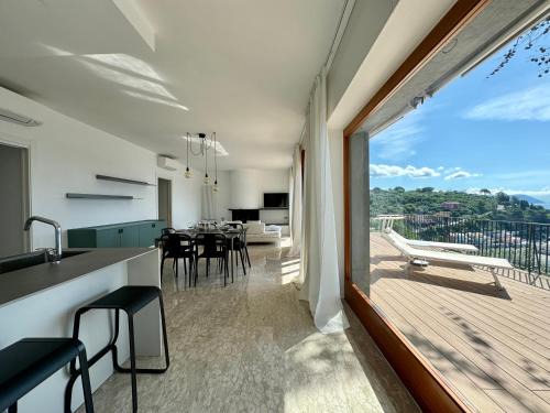 Portovenere Apartment | Elegant modern and bright flat with splendid terrace overlooking the sea and Palmaria Island Modern designer interior accommodates up to six people