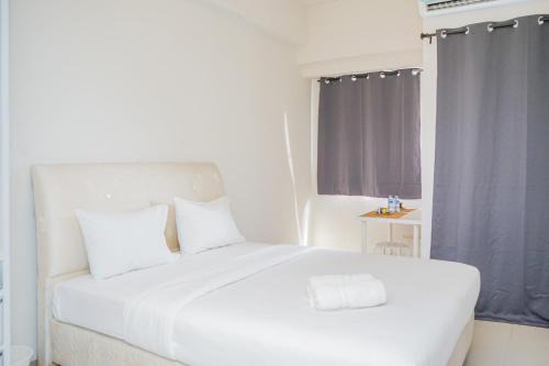 Serpong Apartment | Elegant Studio Parkland Avenue Apartment By Travelio