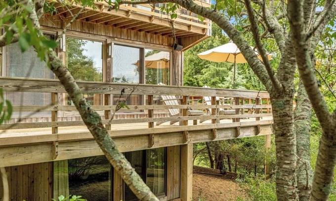Hay Beach House | Elegant Treetop Modern Steps from Hay Beach, Heated Gunite Pool