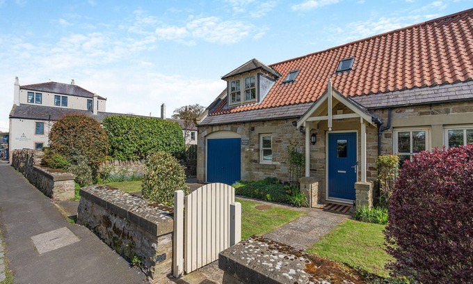 Beadnell Cottage | Embrace Coastal Comforts by the Fire: Your Perfect Retreat Awaits in Beadnell.