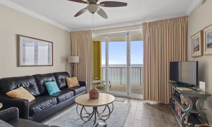 West Panama City Beach Condo | Emerald Isle 1401 - Front row beach chair service included! Affordable rates!