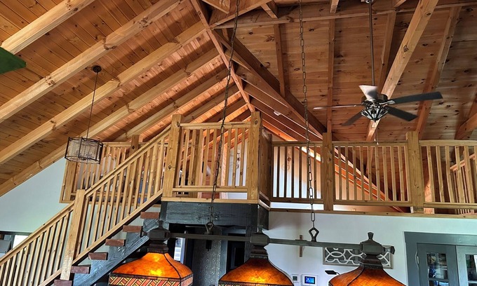 Ray County House | Enchanting cabin offers the perfect blend of rustic charm & modern luxury.