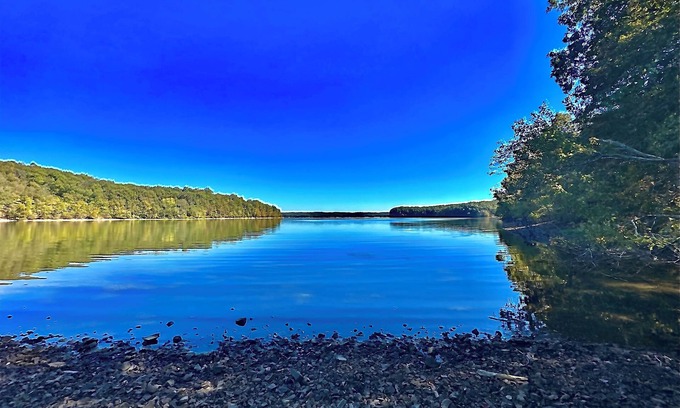 Aurora Cabin | Enjoy a cozy getaway in a rustic log cabin on Kentucky Lake. With Hottub