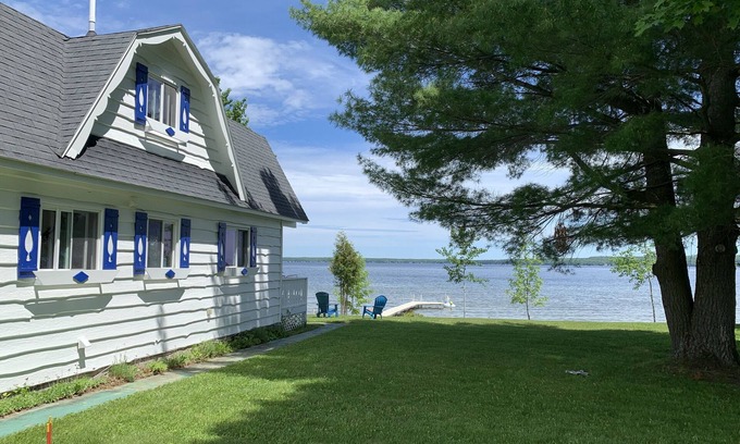 Burt Lake Ski Chalet | Enjoy all four seasons at the Swiss Chalet located on the shore of Burt Lake.