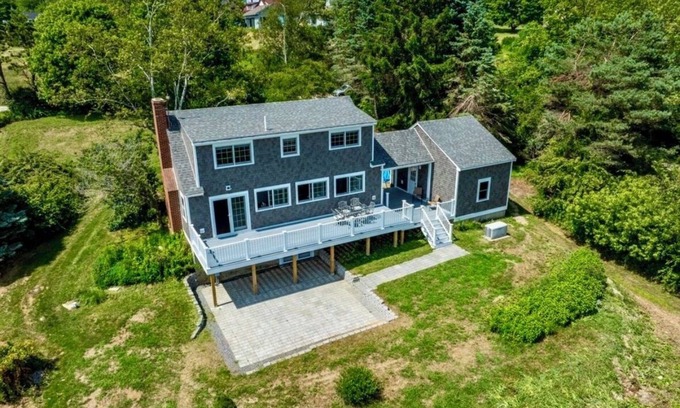 Harpswell House | Enjoy coffee & sunrise on the fabulous waterfront porch at a Harpswell retreat!