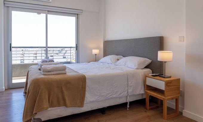 Comuna 10 Apartment | Enjoy our apartment. Fully equipped kitchen, AC, TV, WiFi, and Queen bed.