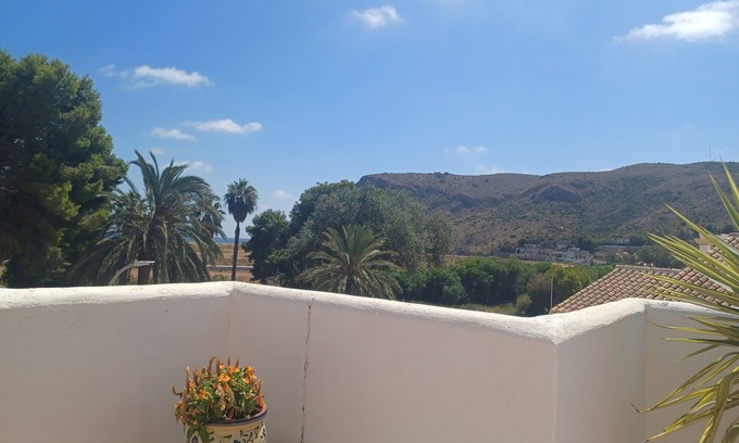 Portman Apartment | Enjoy the best sunset in this picturesque village.