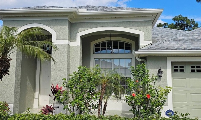 Tarpon Springs House | Enjoy this Exclusive - 4 Bedroom FL Home with Privacy Fence and Private Pool