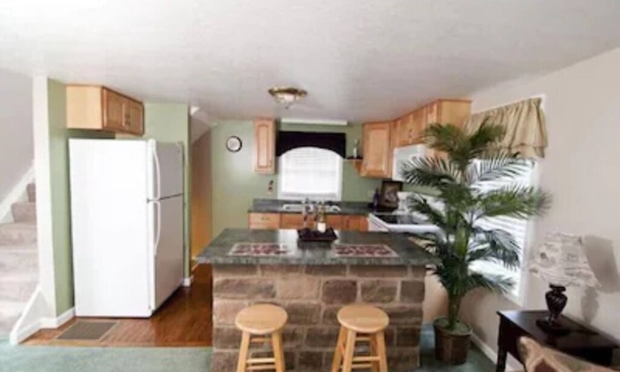 Dundee Cottage | Escape to our romantic stone cottage by a pond overlooking Amish country