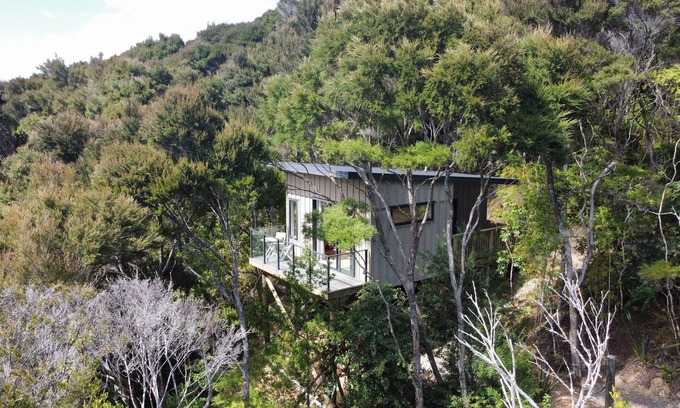 Opua Cabin | Escape to this romantic cabin in amongst the trees.