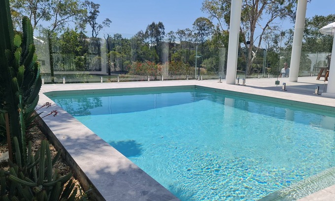 Varsity Lakes House | Escape to Your Own Waterfront Palm Springs Oasis on the Gold Coast!