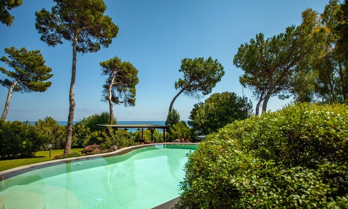 Santa Margherita di Pula Villa | exclusive seafront villa direct beach access with private pool