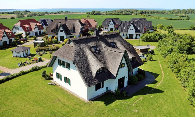 Dassow Apartment | Exclusive apartment Peter Pan in a thatched cottage with sea views, sauna and wireless internet