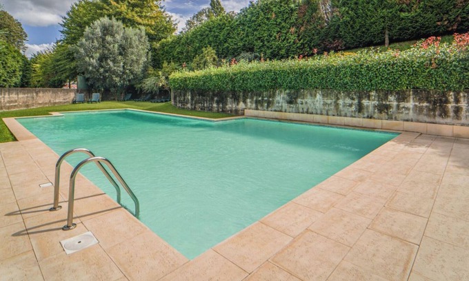 Portela Apartment | Exclusive flat, family-friendly with private pool, gardens and playground!