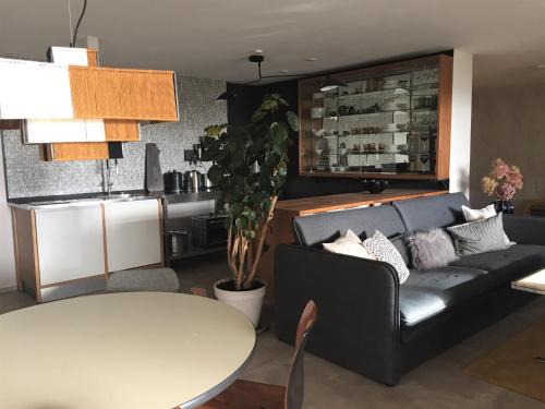 Immenstadt im Allgaeu Apartment | Exklusiver Souterrain - zentral, ruhig mit großer Terrasse, Bergblick und privaten Sauna zzgl