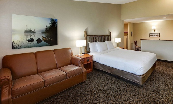 Peoria Hotel | Expanded King in Stoney Creek Peoria! Living Room with Sofa Sleeper